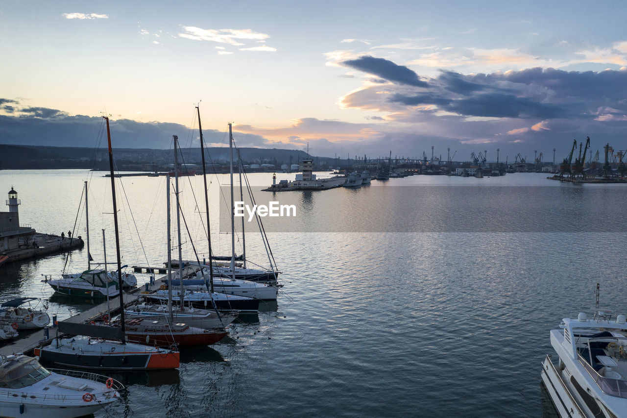 Aerial view of yachts and boats in the port at sunset. black sea, varna, bulgaria.