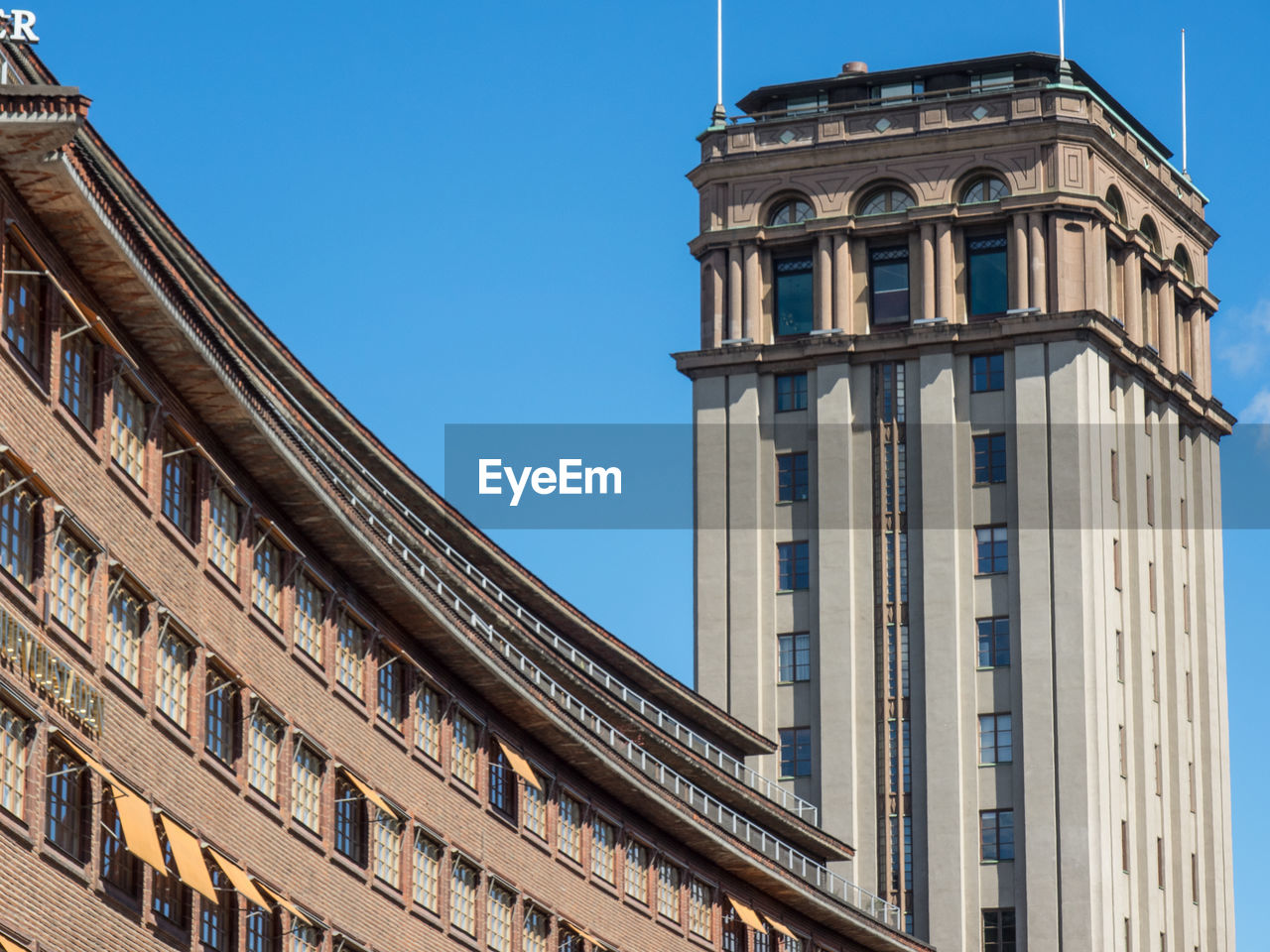 Low angle view of buildings against clear sky