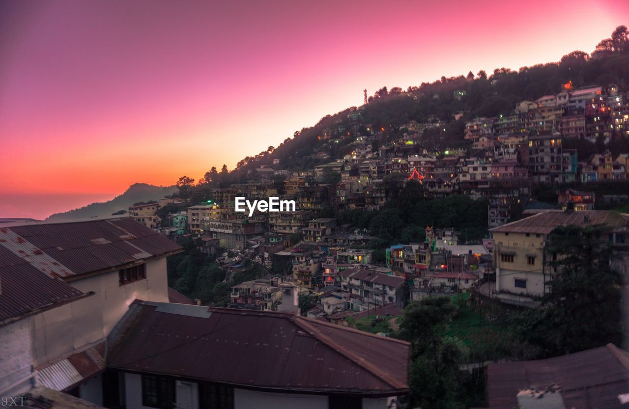 TOWN AGAINST SKY DURING SUNSET