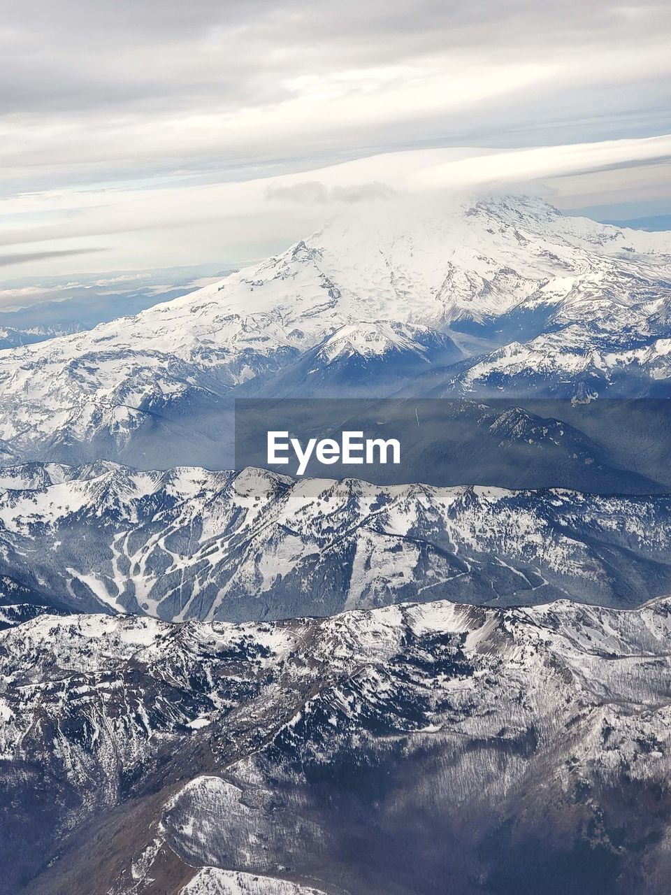 Scenic view of snowcapped mountains against sky specifically mount rainier