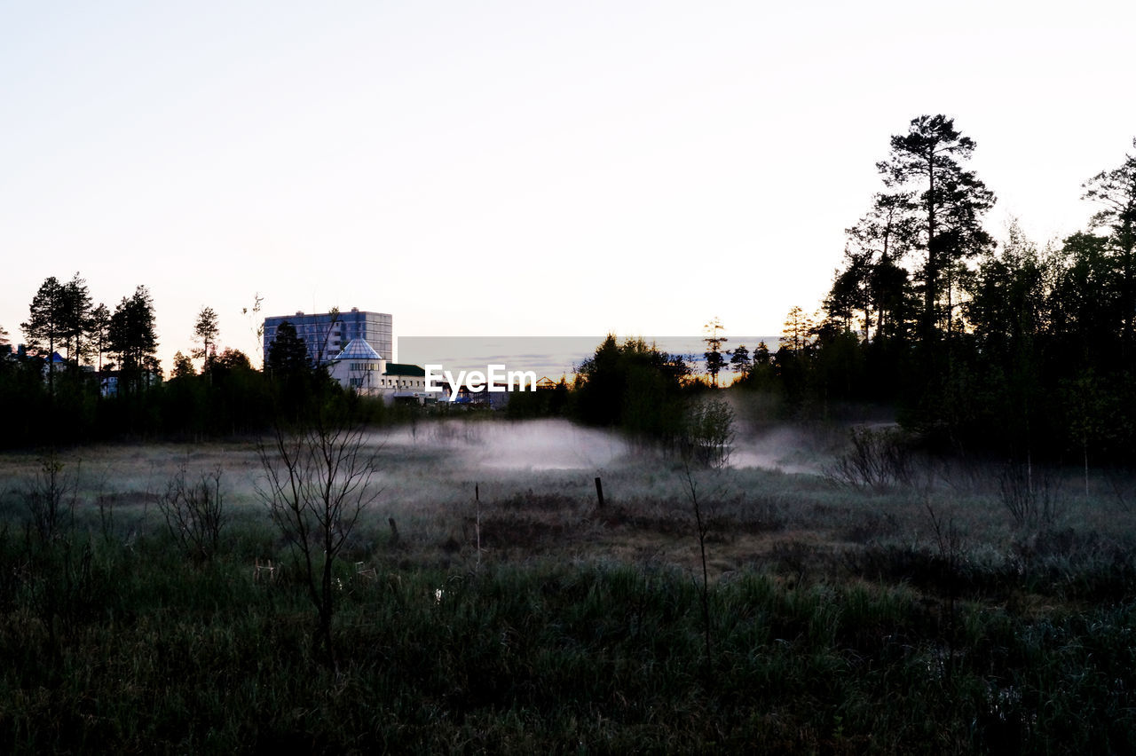 VIEW OF BUILT STRUCTURES IN DISTANCE