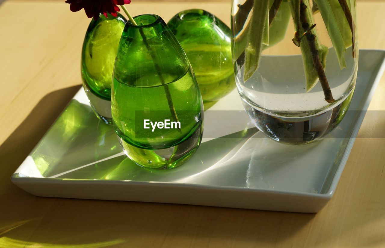 High angle view of drinks on table