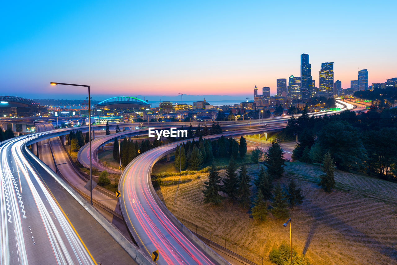 High angle view of light trails on road in city