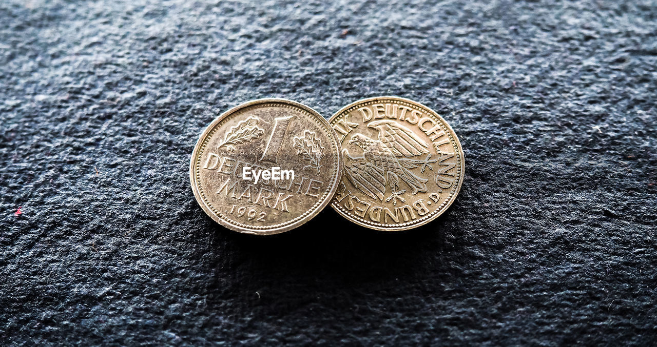 Close-up of one deutsche mark coins on table