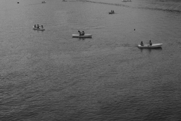 VIEW OF BOATS IN SEA