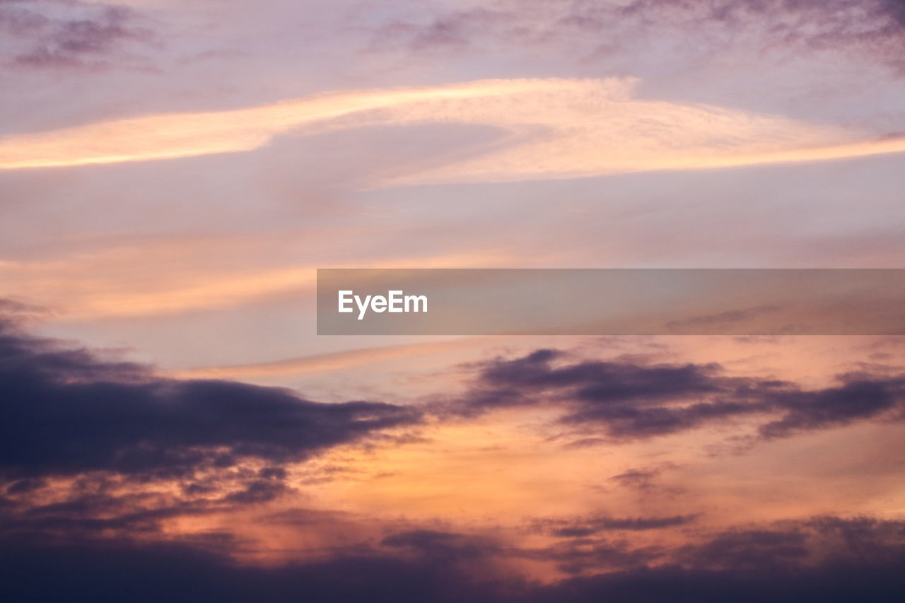 SCENIC VIEW OF DRAMATIC SKY DURING SUNSET