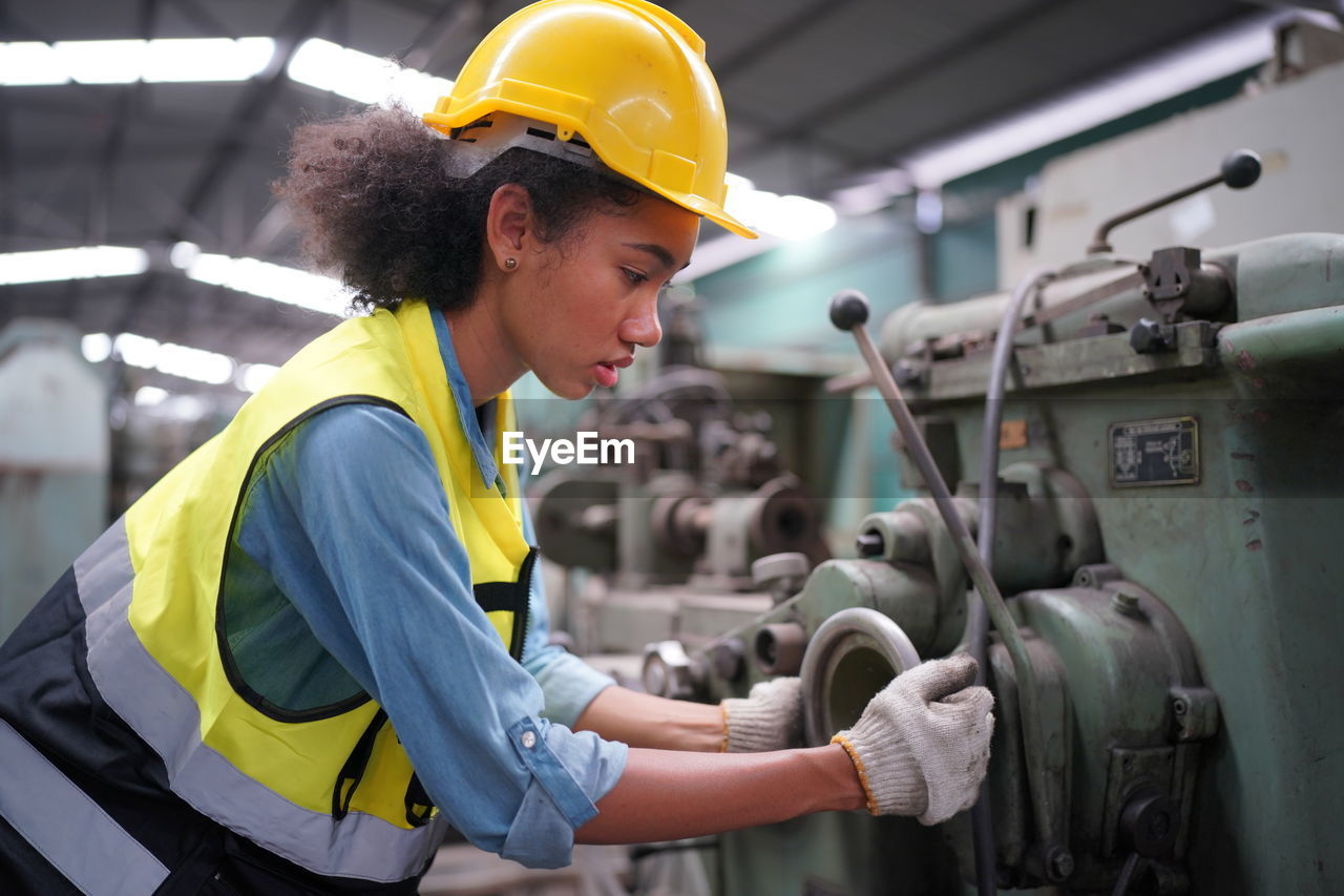 side view of engineer working at construction site