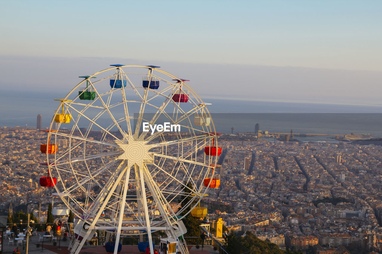 Ferris wheel on top of the city, at tibidabo, barcelona