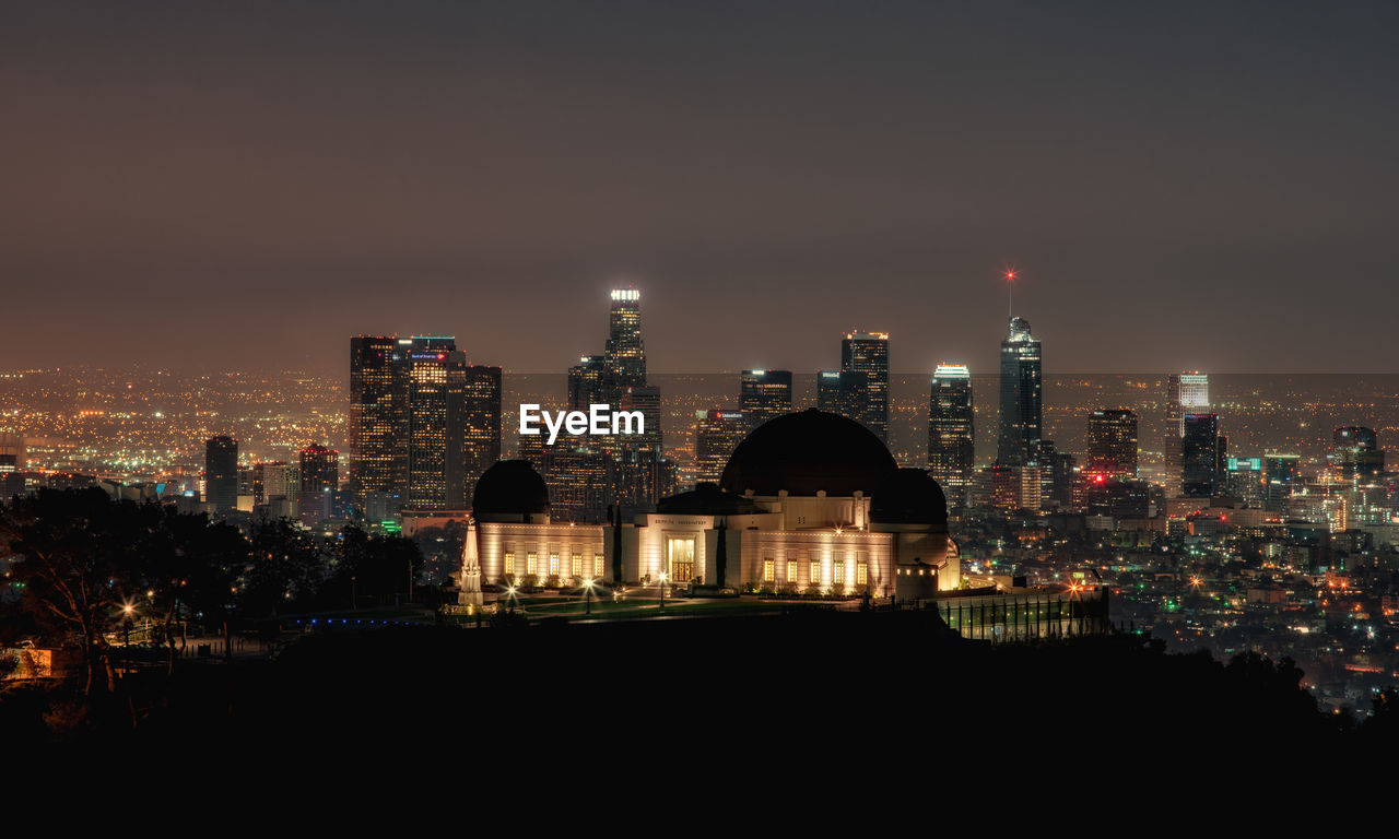 Illuminated cityscape at night