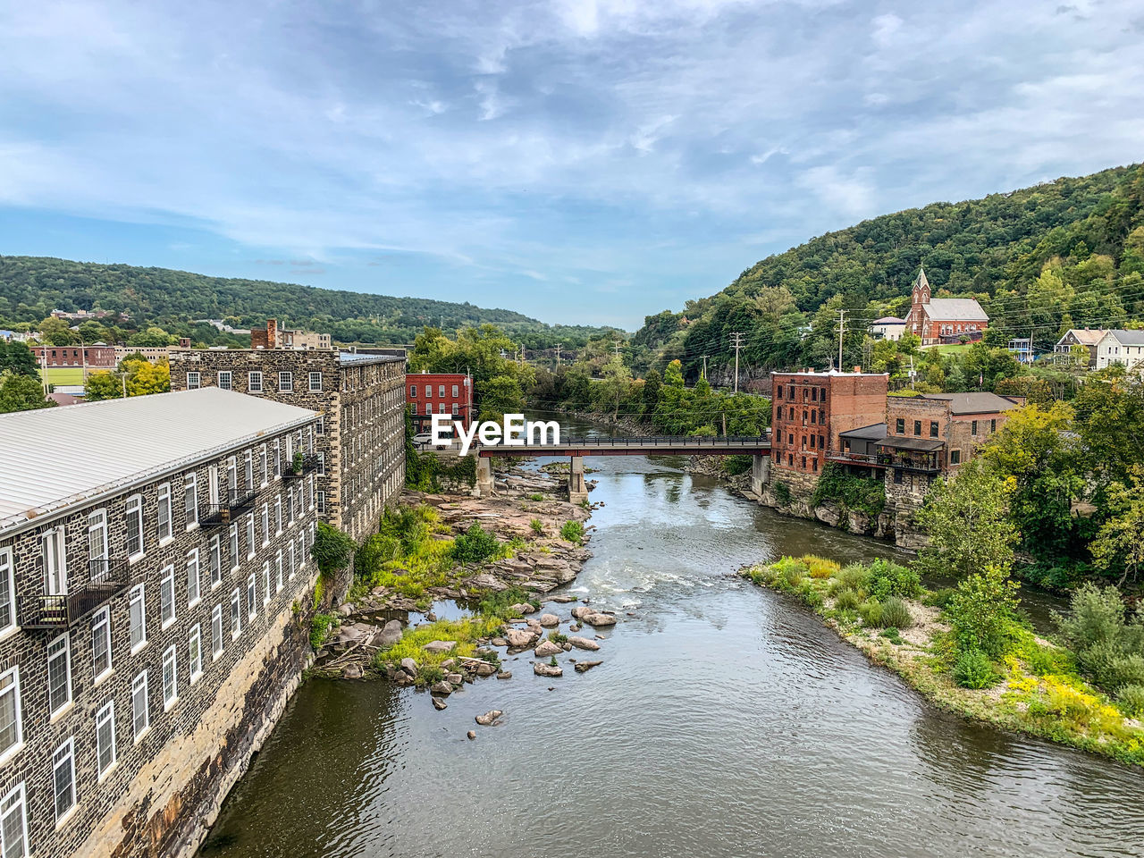 High angle view of river amidst buildings in city