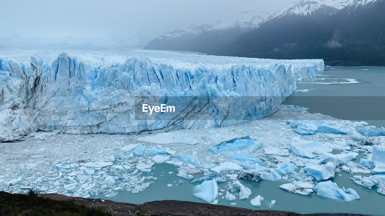 SCENIC VIEW OF FROZEN LAKE