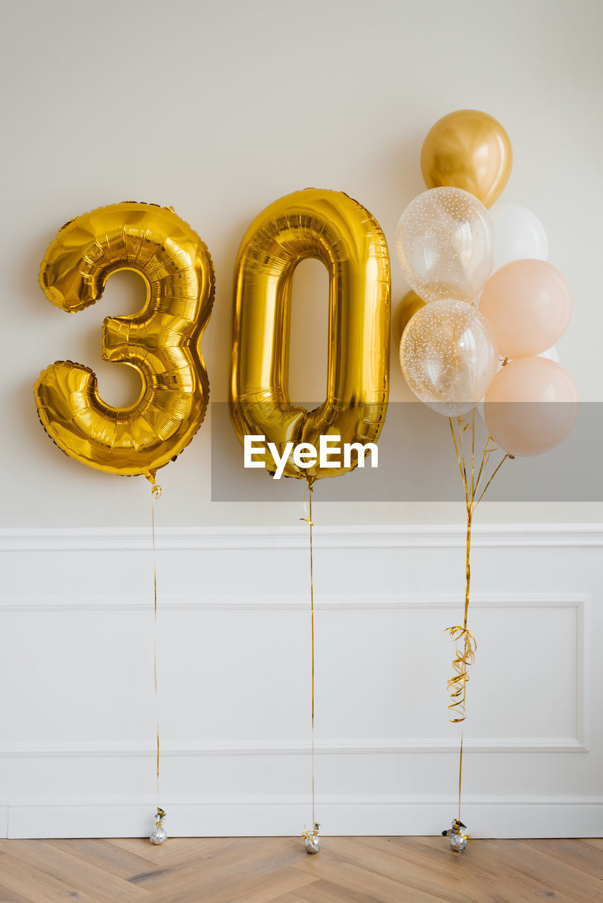 Festive helium balloons in gold and white, number 30