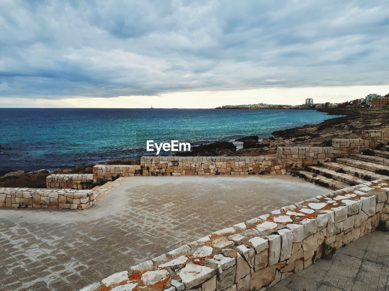 High angle view of beach against cloudy sky