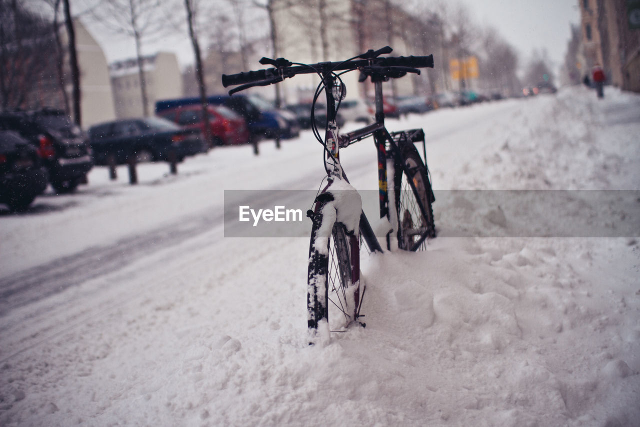Bicycle on snow covered road