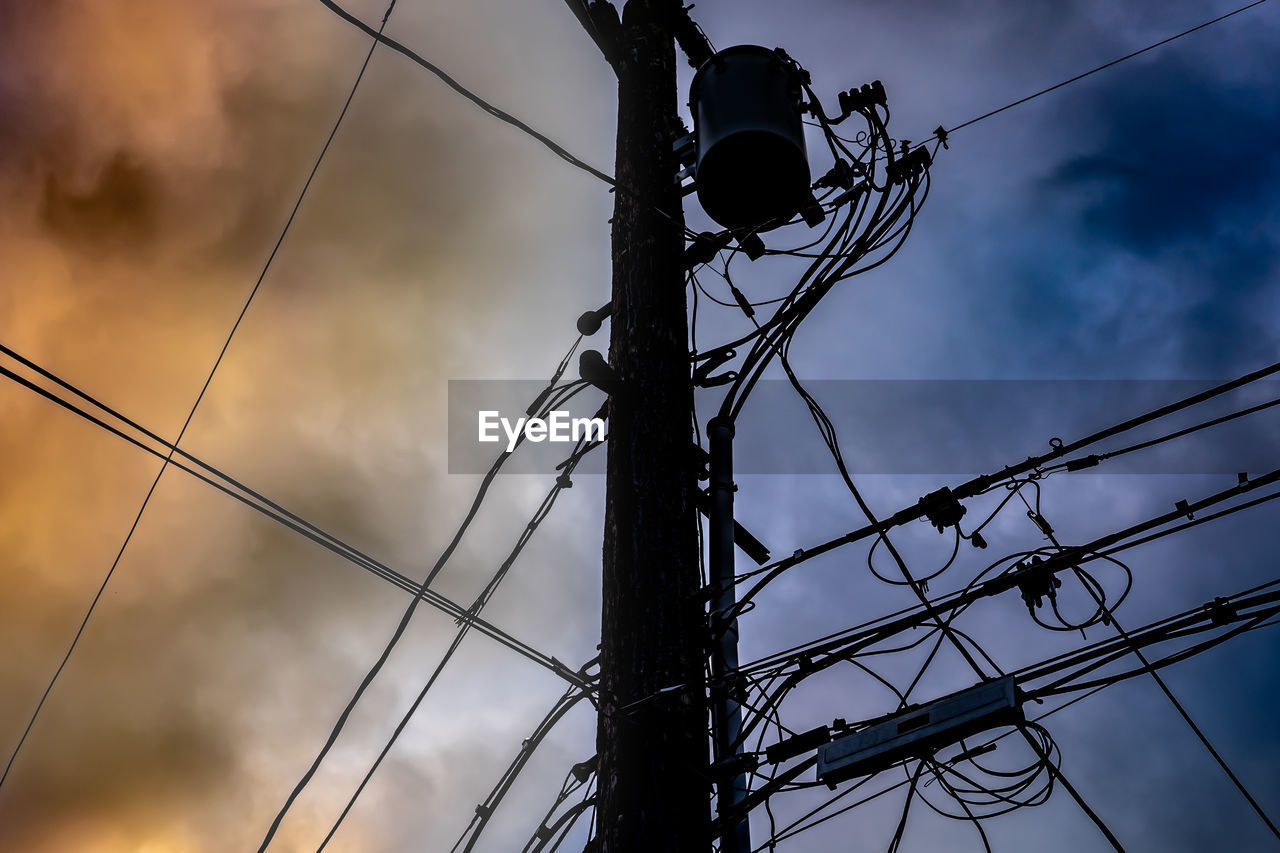 LOW ANGLE VIEW OF POWER LINES AGAINST SKY