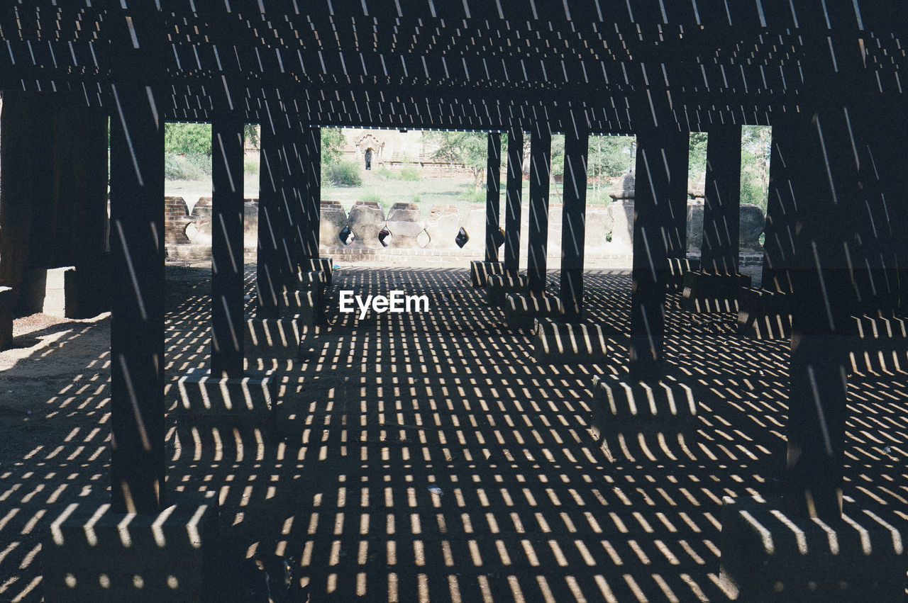 Sunlight falling under bridge