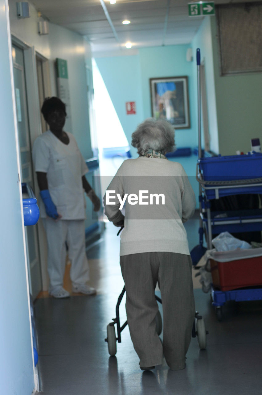 Rear view of woman in hospital