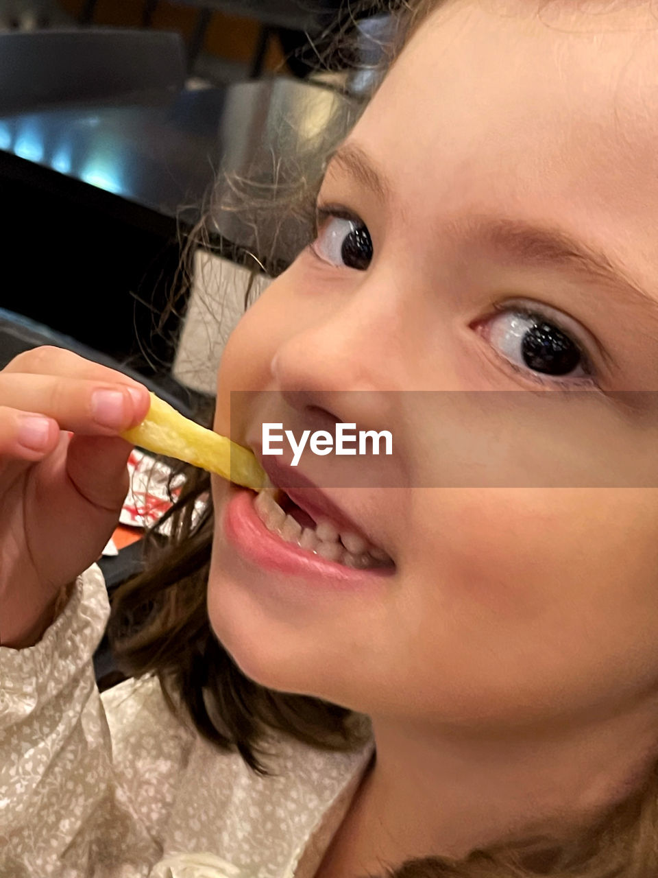 portrait, human face, child, childhood, nose, skin, women, one person, person, headshot, female, human mouth, human head, smiling, food, eating, food and drink, close-up, human eye, looking at camera, lip, holding, lifestyles, baby, indoors, adult, happiness, cute, human hair, eye, emotion, hand, toddler, wellbeing