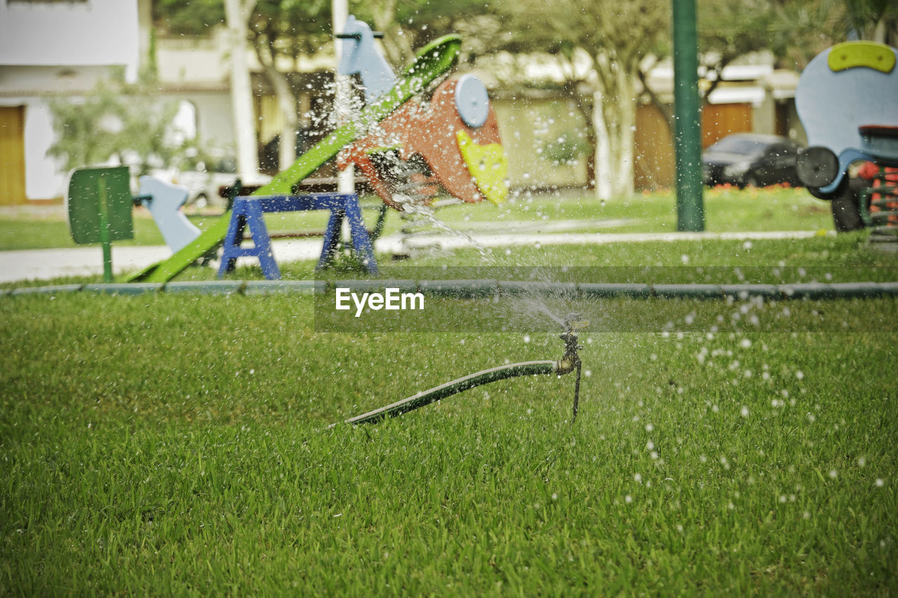 CHILDREN PLAYING IN WATER