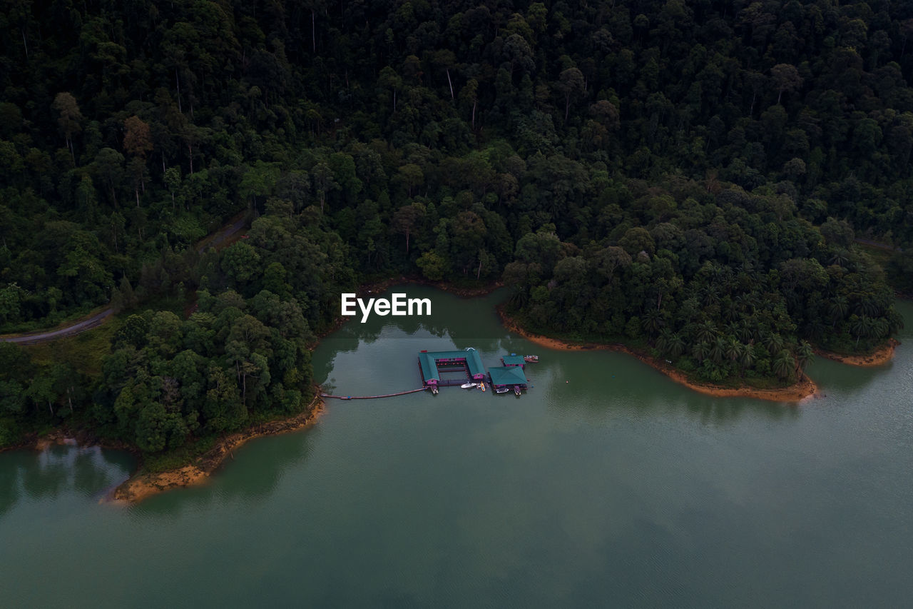 Aerial top view of water chalet resort in kenyir lake, terengganu, malaysia.