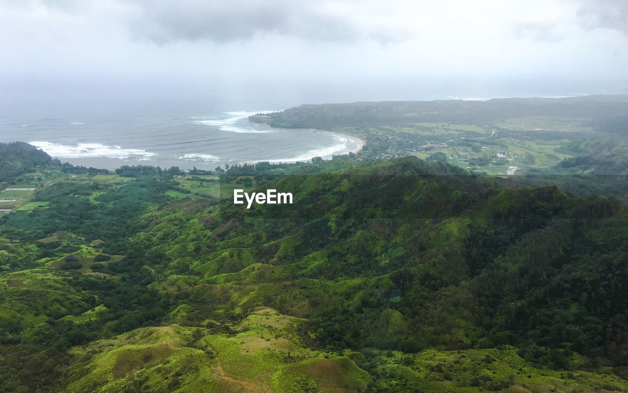 High angle view of sea against cloudy sky