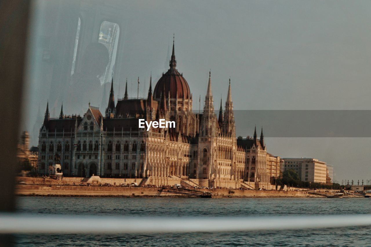 VIEW OF BUILDINGS WITH WATERFRONT