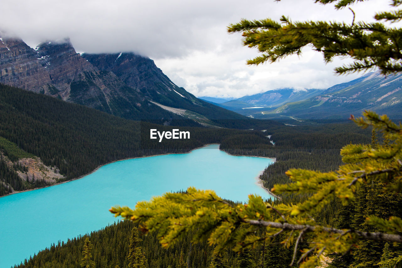 Scenic view of lake and mountains against sky