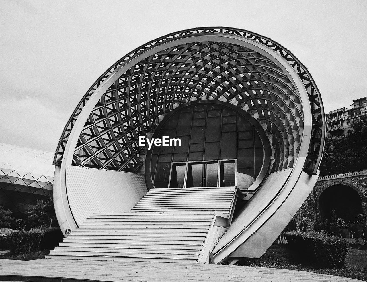 LOW ANGLE VIEW OF STAIRCASE OF BUILDING AGAINST SKY