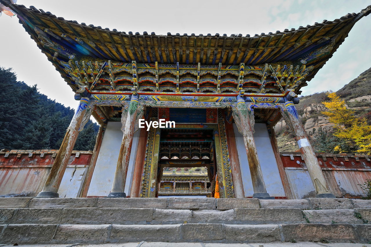 Low angle view of temple building against sky