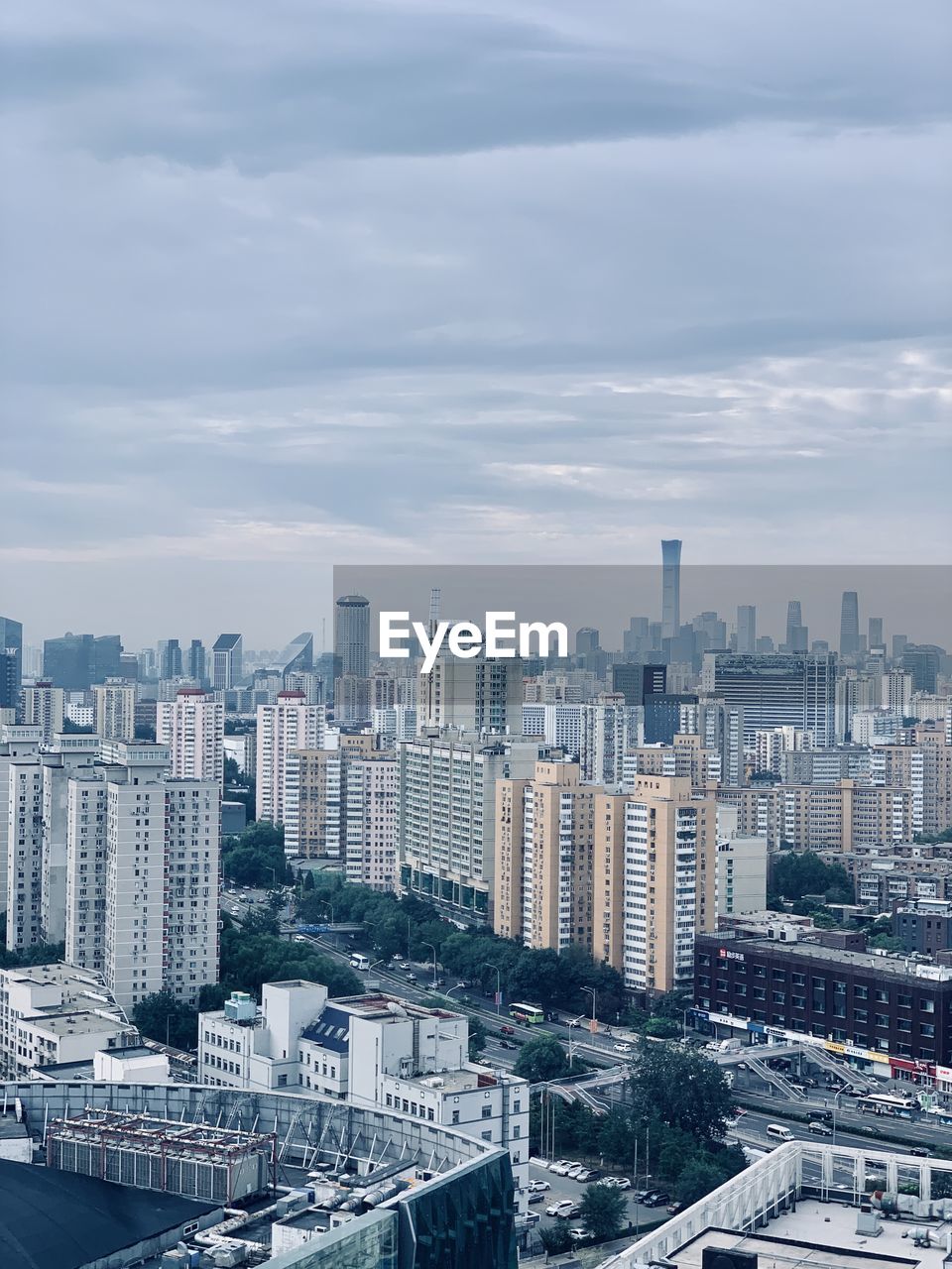 High angle view of buildings in city against sky