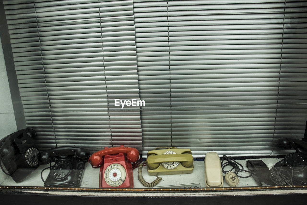 High angle view of rotary phones in store