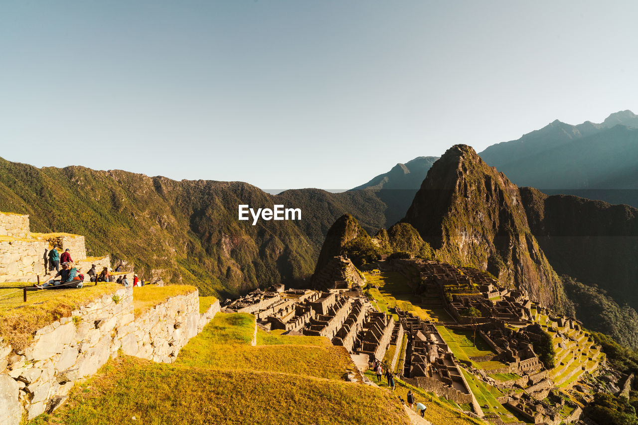 Machu picchu old inca ruins at sunrise in peru