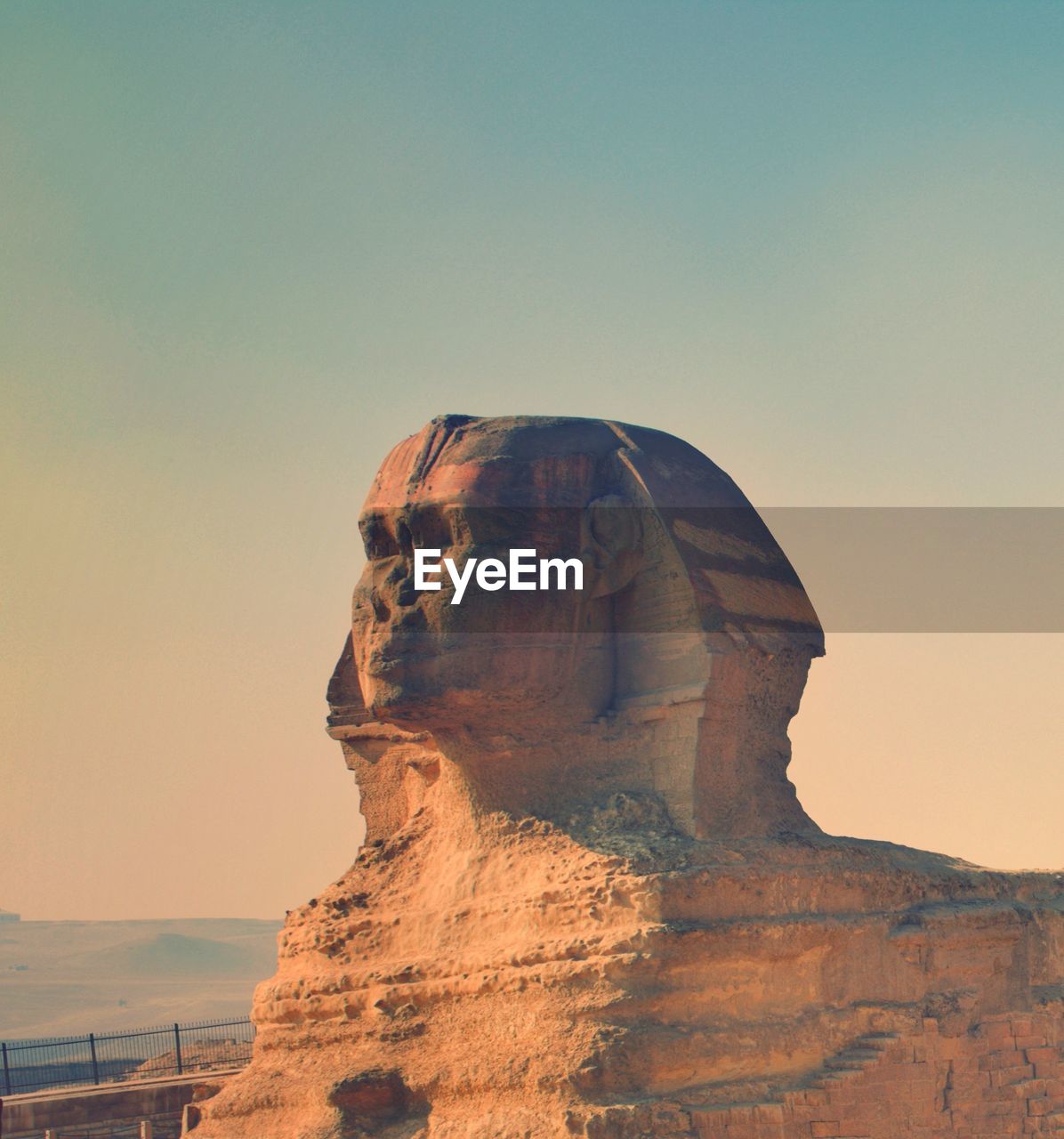 Statue of liberty against sky during sunset