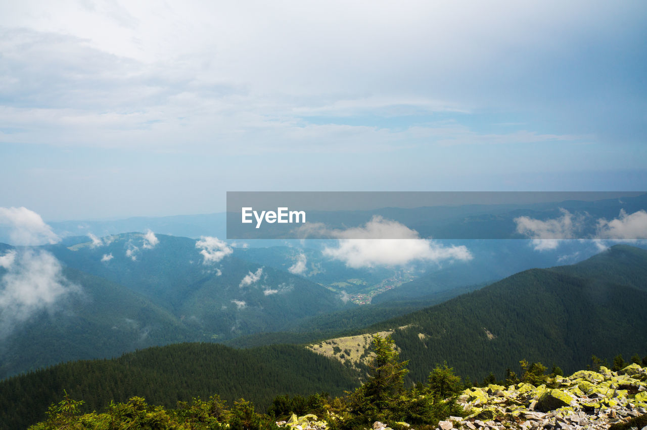 SCENIC VIEW OF MOUNTAIN AGAINST SKY