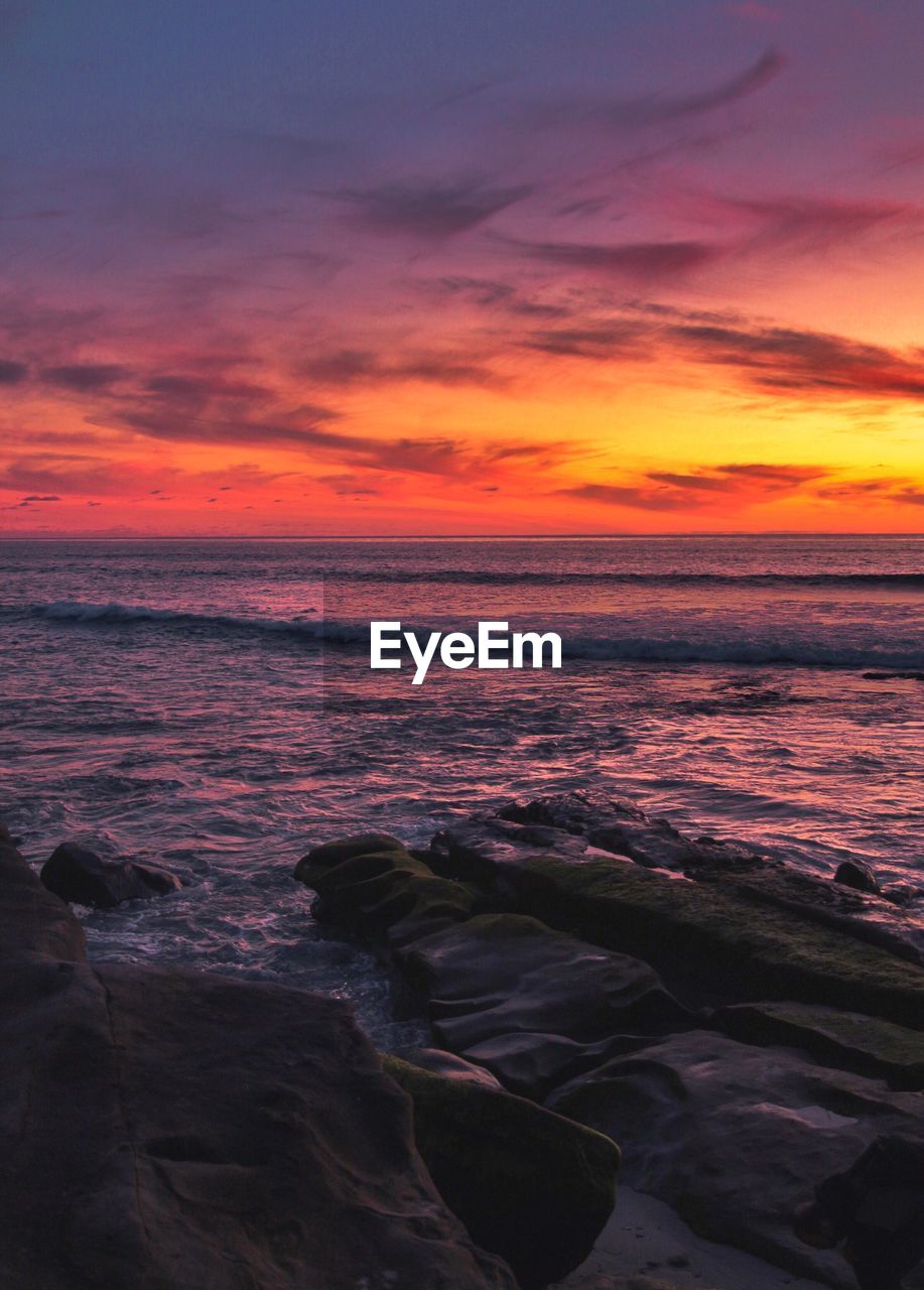 Scenic view of sea against sky during sunset