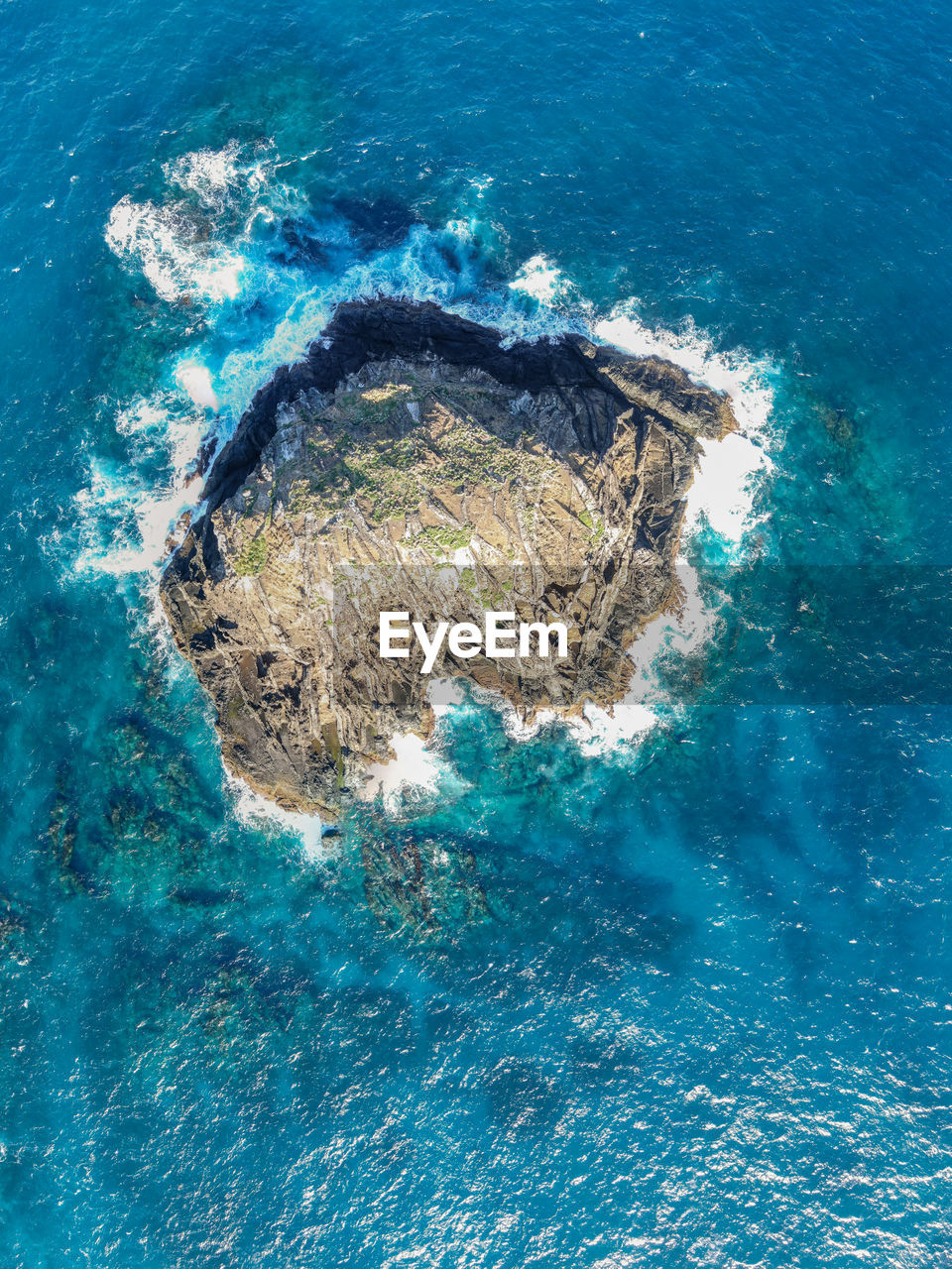 Drone shot of sugar loaf, an isolated rock, admiralty islands near lord howe island, nsw, australia.