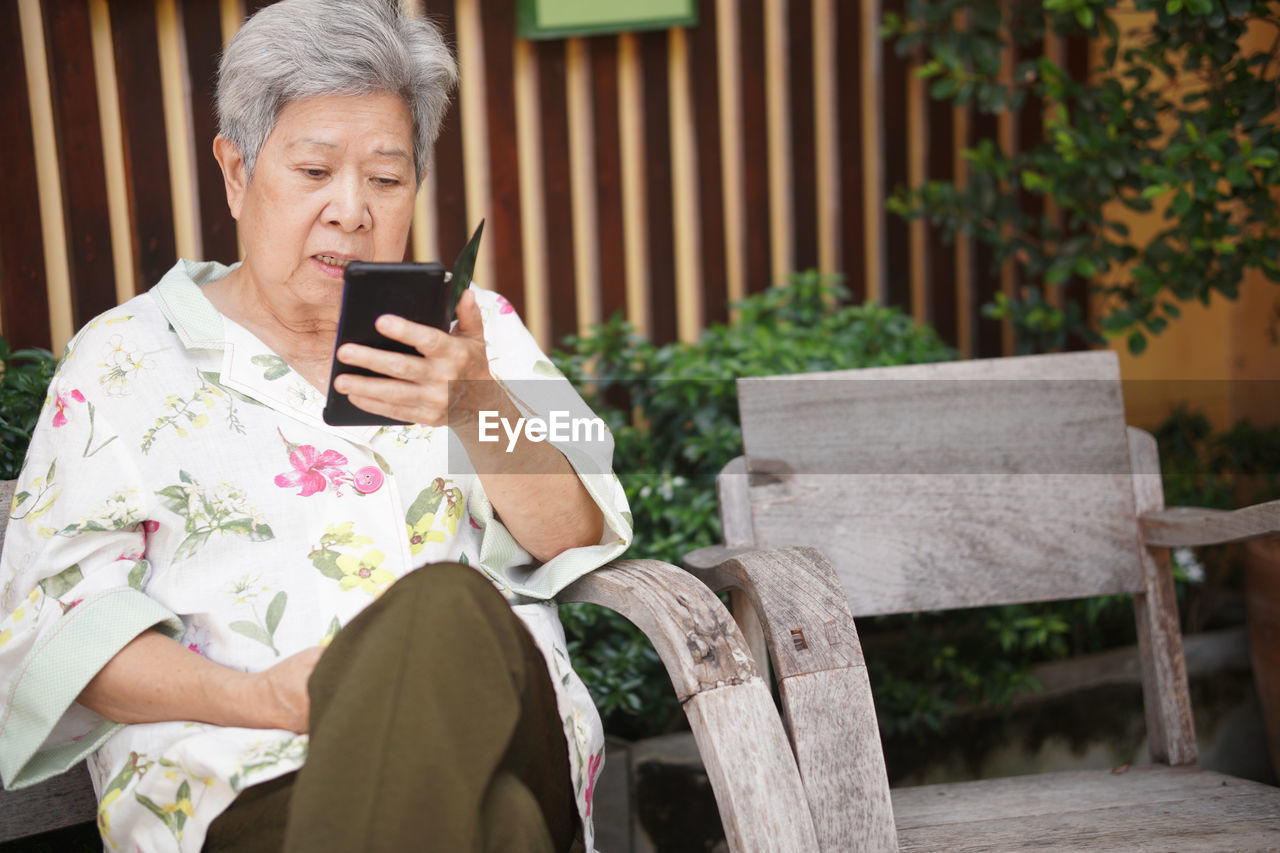 young woman using mobile phone