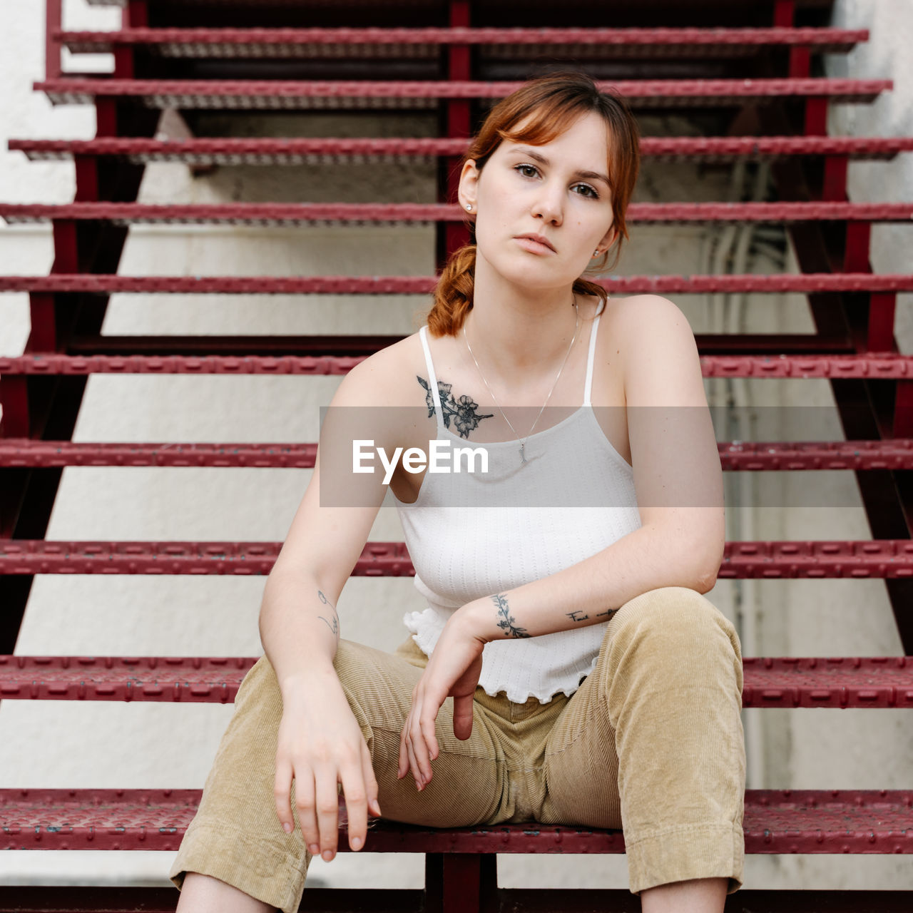 Urban portrait of a young woman in the middle of the city