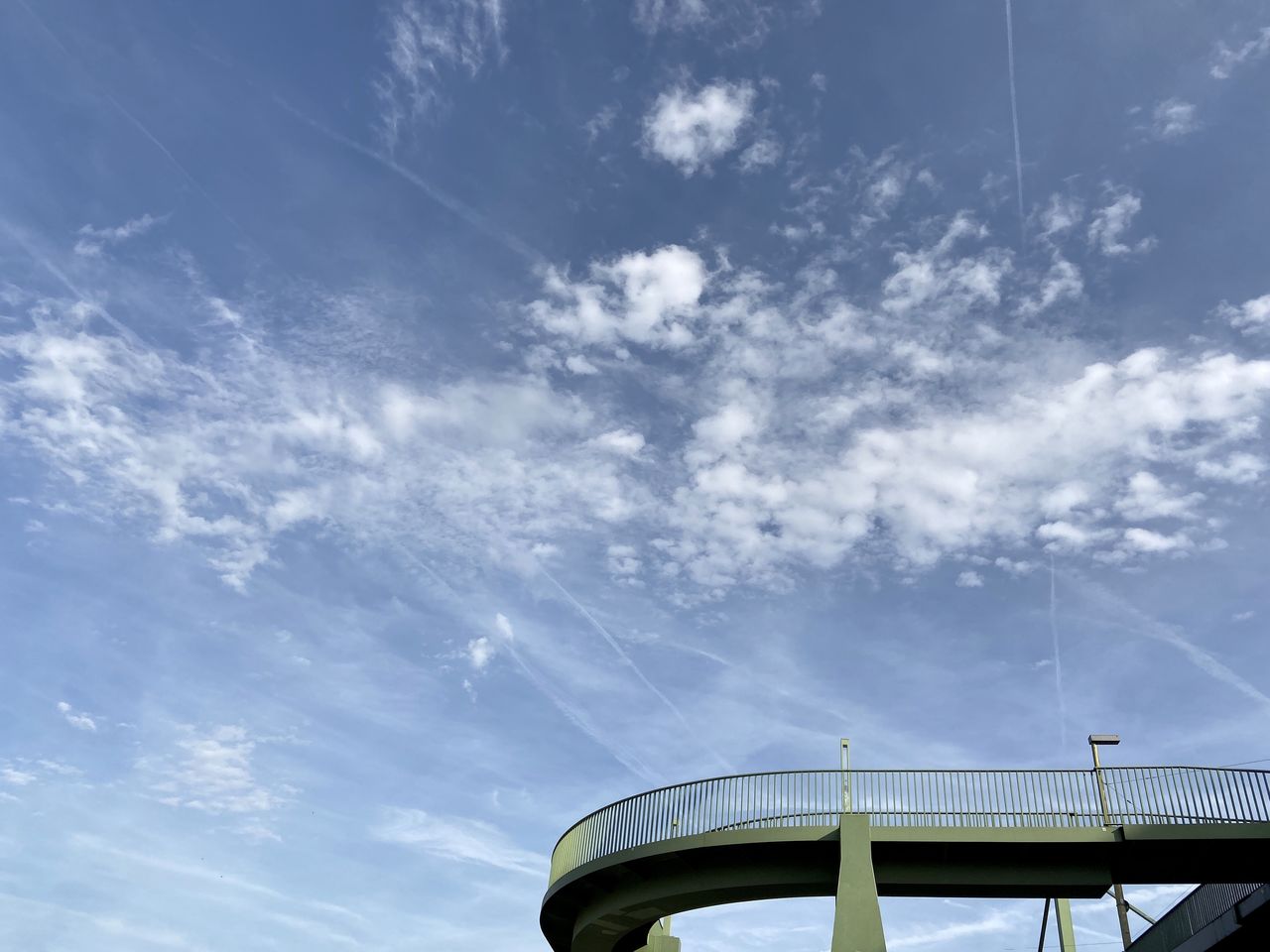 Low angle view of bridge against sky on sunny day