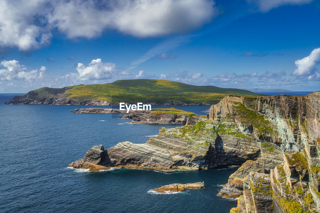 Beautiful kerry cliffs illuminated by sunlight and a view on bray head