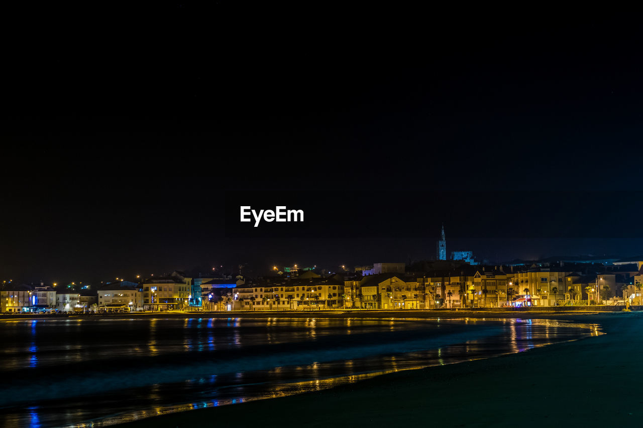 Panoramic night view of the town of panxon. small tourist town of the rias baixas