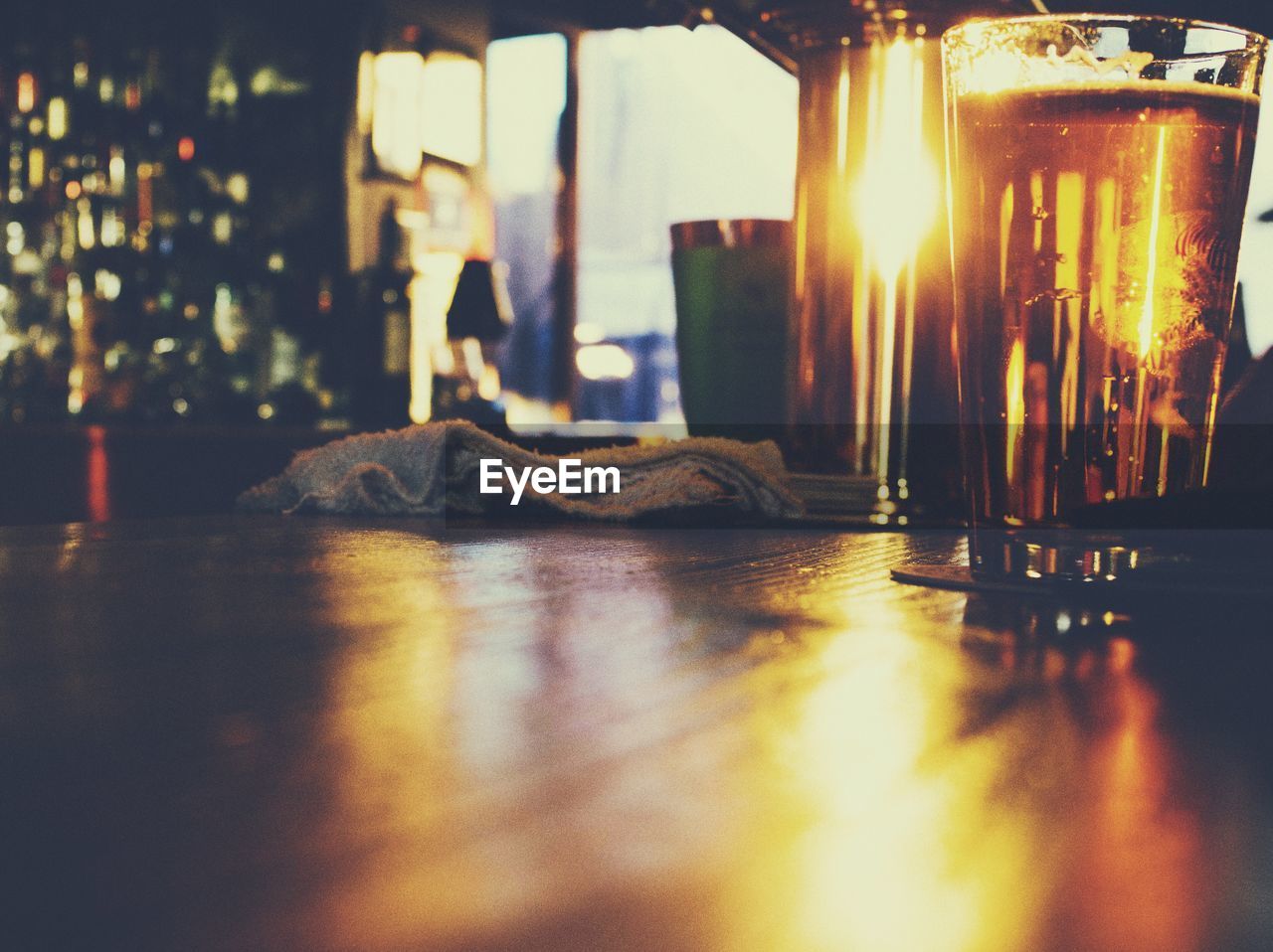 Pint of beer on bar counter