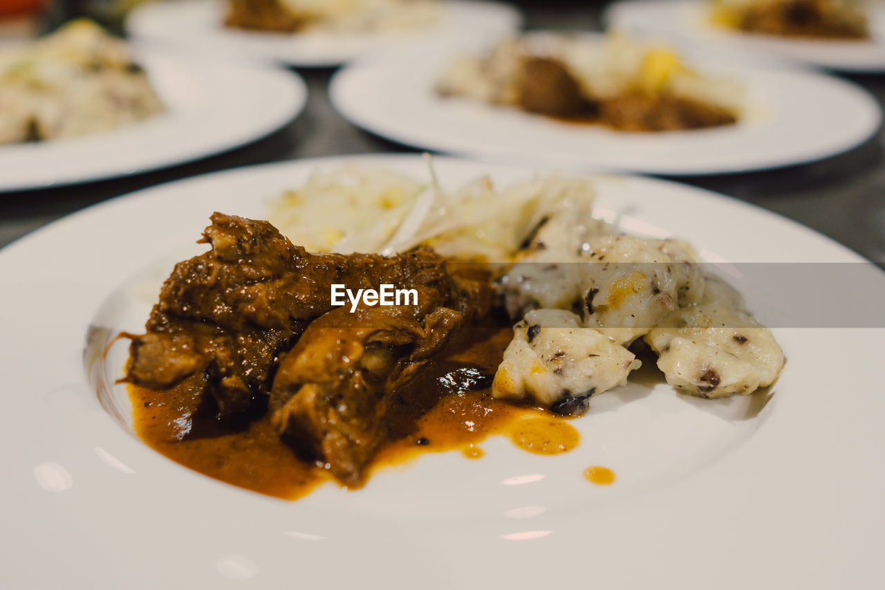 CLOSE-UP OF FOOD ON TABLE