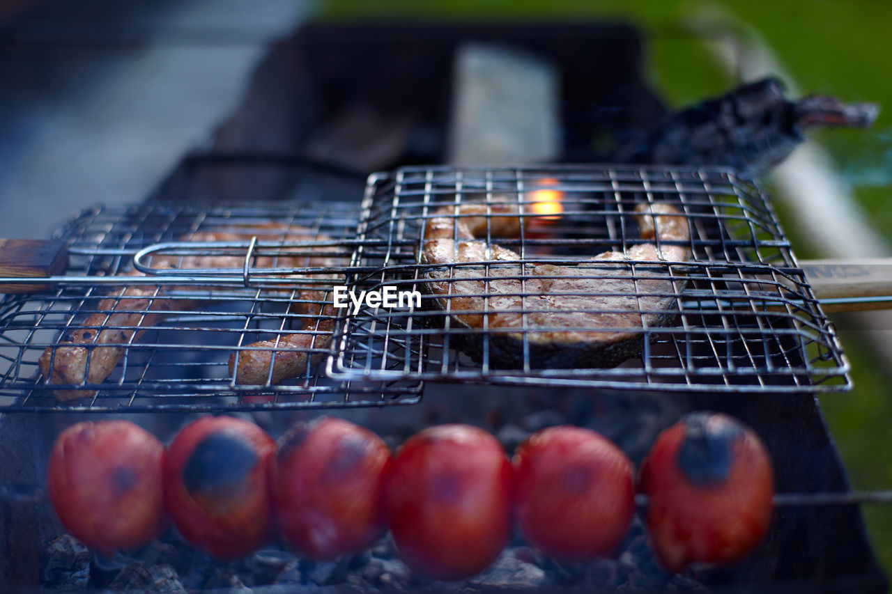 Close-up of meat on barbecue grill