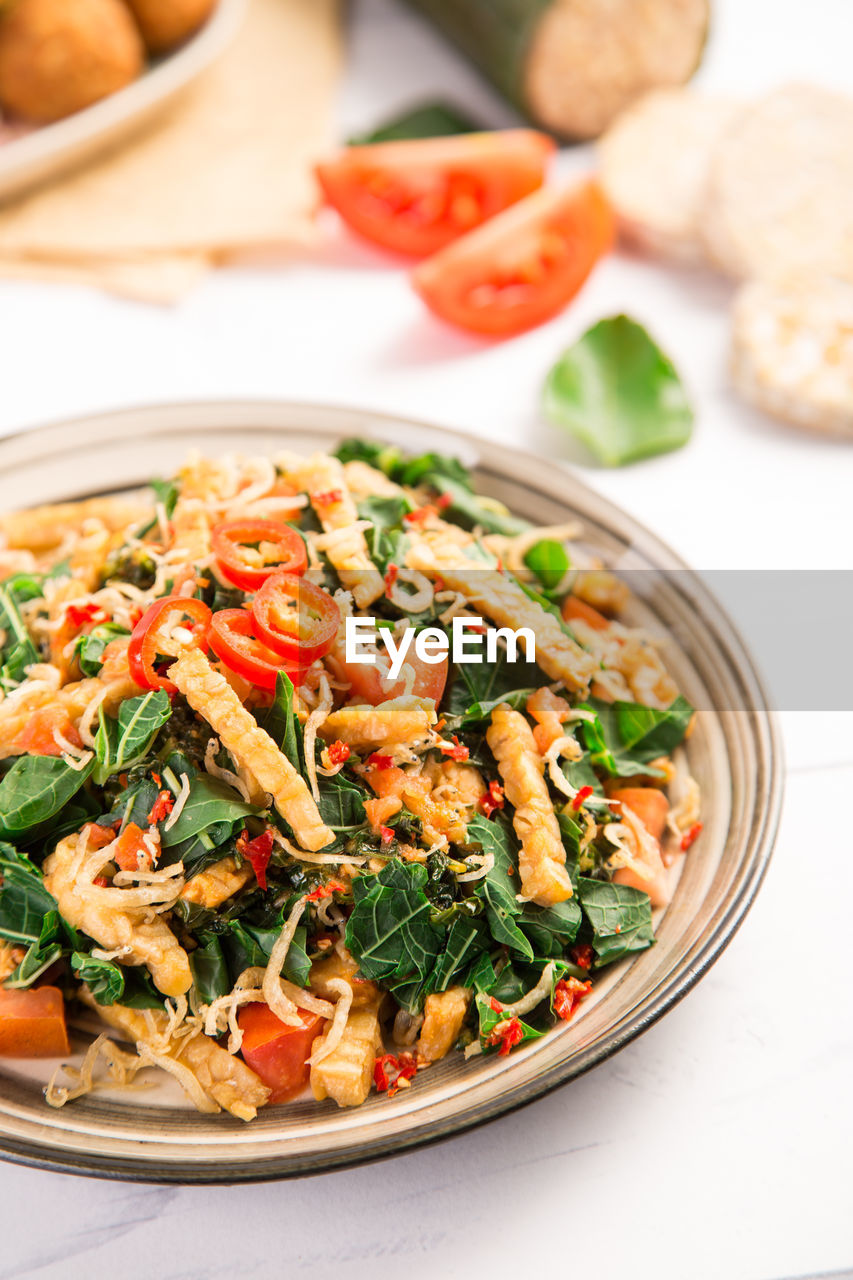 Close-up of salad in bowl on table