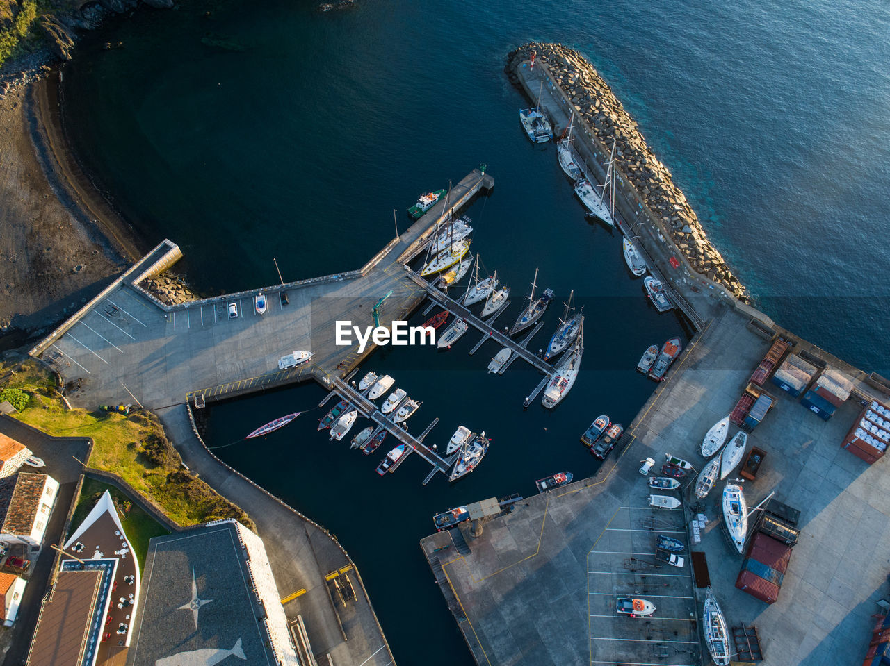 Aerial view of boats moored at harbor