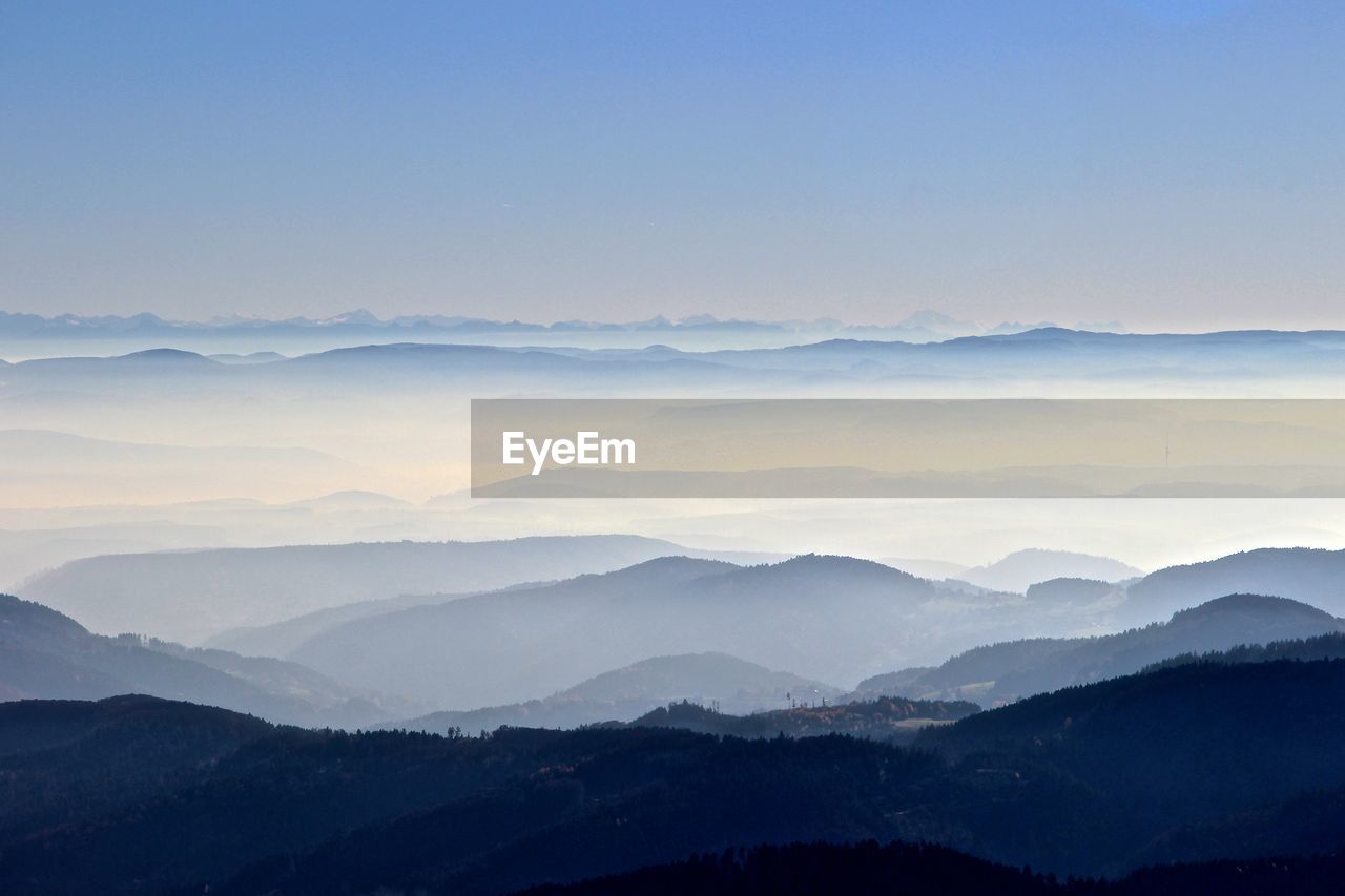 Scenic view of alps against sky during sunset