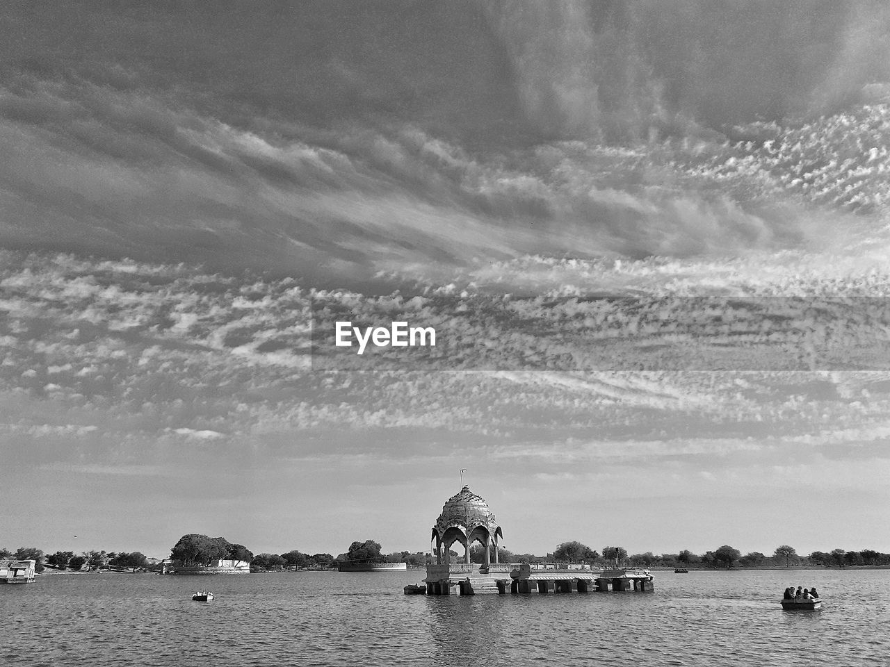 PANORAMIC VIEW OF SEA BY TEMPLE AGAINST SKY