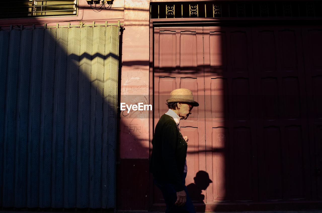 Woman walking by door