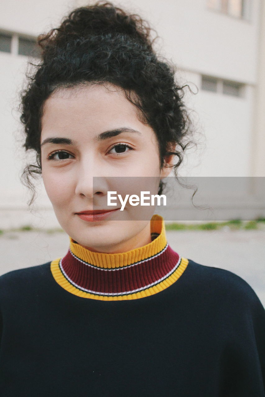 Portrait of a smiling young woman